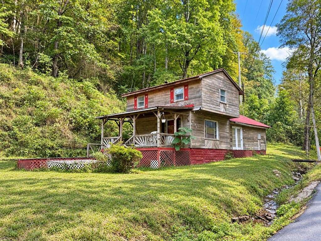 21 Acres of Land with Home for Sale in McVeigh, Kentucky