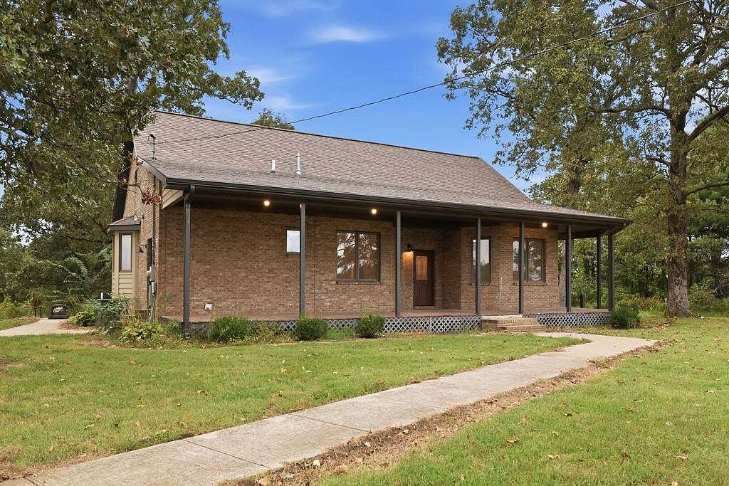 6.5 Acres of Land with Home for Sale in Mayfield, Kentucky