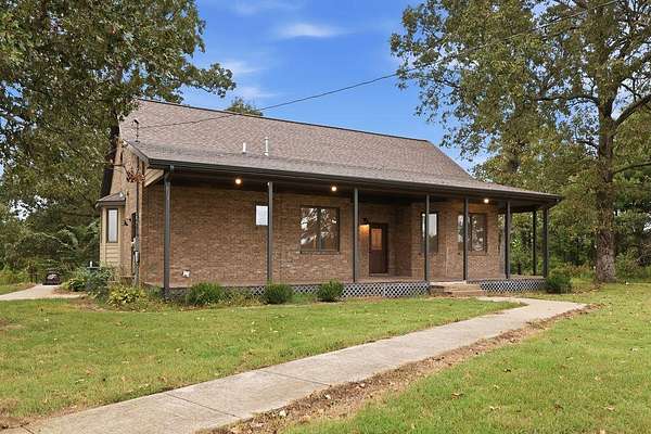 6.5 Acres of Land with Home for Sale in Mayfield, Kentucky