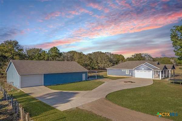 10.4 Acres of Recreational Land with Home for Sale in Paige, Texas