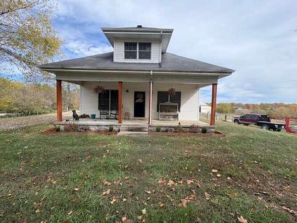 6.55 Acres of Land with Home for Sale in Waddy, Kentucky