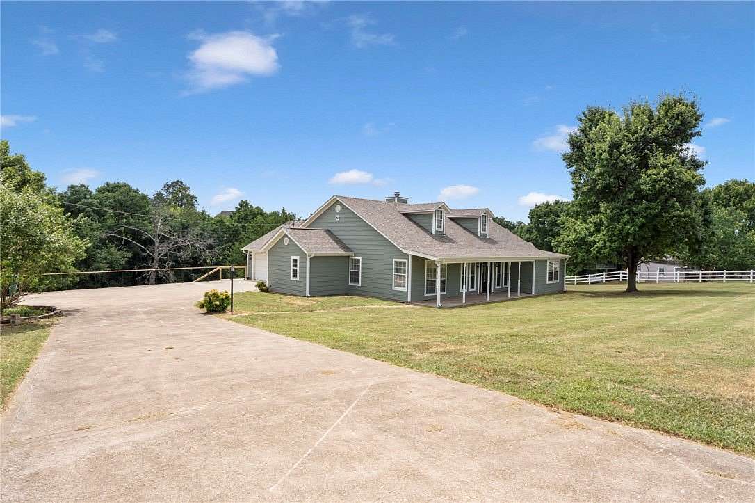 1.79 Acres of Land with Home for Sale in Tontitown, Arkansas