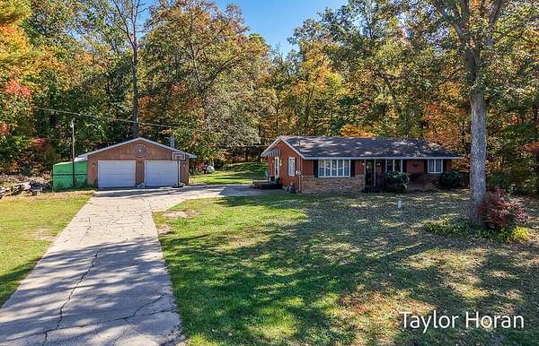 5 Acres of Land with Home for Sale in Twin Lake, Michigan