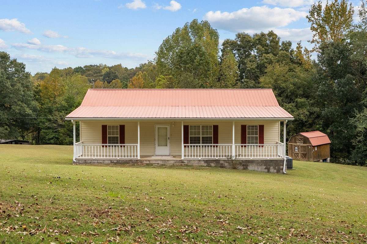 1.8 Acres of Land with Home for Sale in Tennessee Ridge, Tennessee