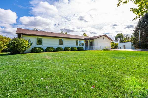 10.6 Acres of Land with Home for Sale in Coloma, Michigan