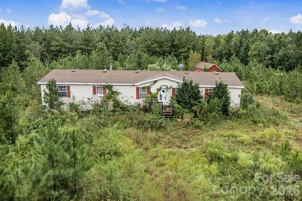 14.4 Acres of Land with Home for Sale in Ellerbe, North Carolina