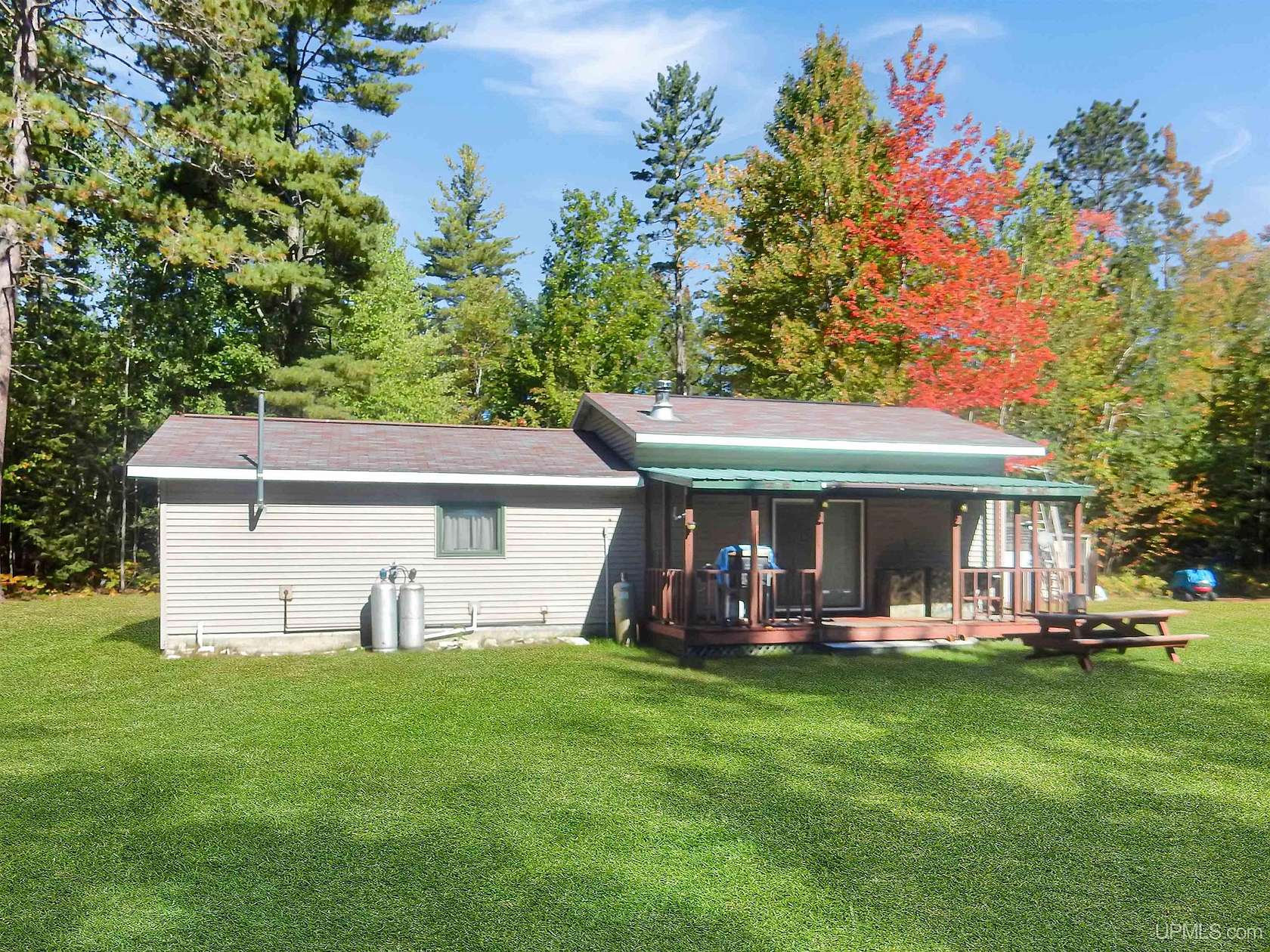 40 Acres of Recreational Land with Home for Sale in Garden, Michigan