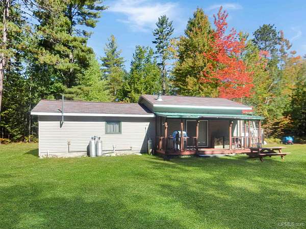 40 Acres of Recreational Land with Home for Sale in Garden, Michigan