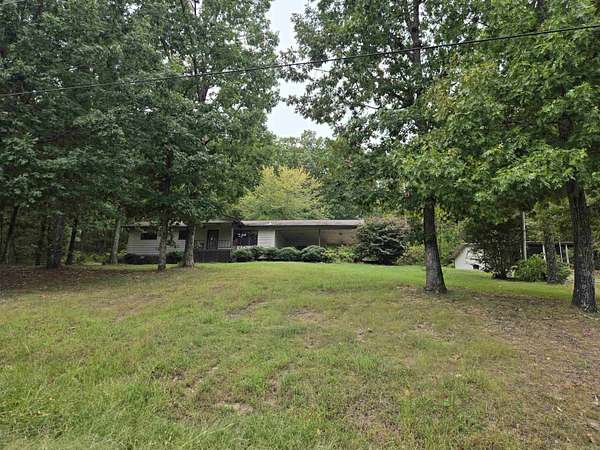 7.76 Acres of Land with Home for Sale in Clinton, Arkansas