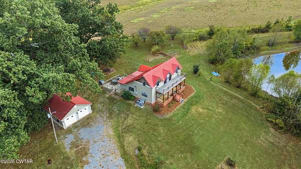 6.63 Acres of Land with Home for Sale in Kenton, Tennessee