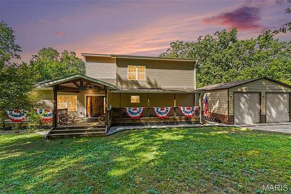 7.3 Acres of Land with Home for Sale in Catawissa, Missouri