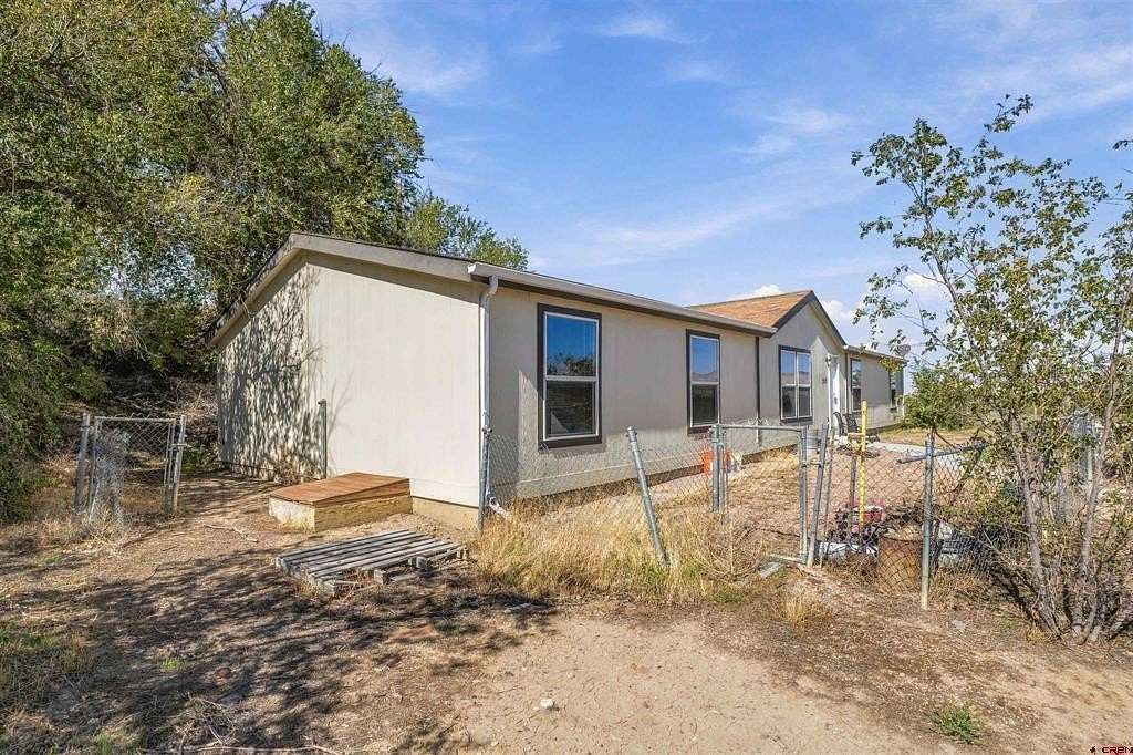 2.46 Acres of Land with Home for Sale in Grand Junction, Colorado