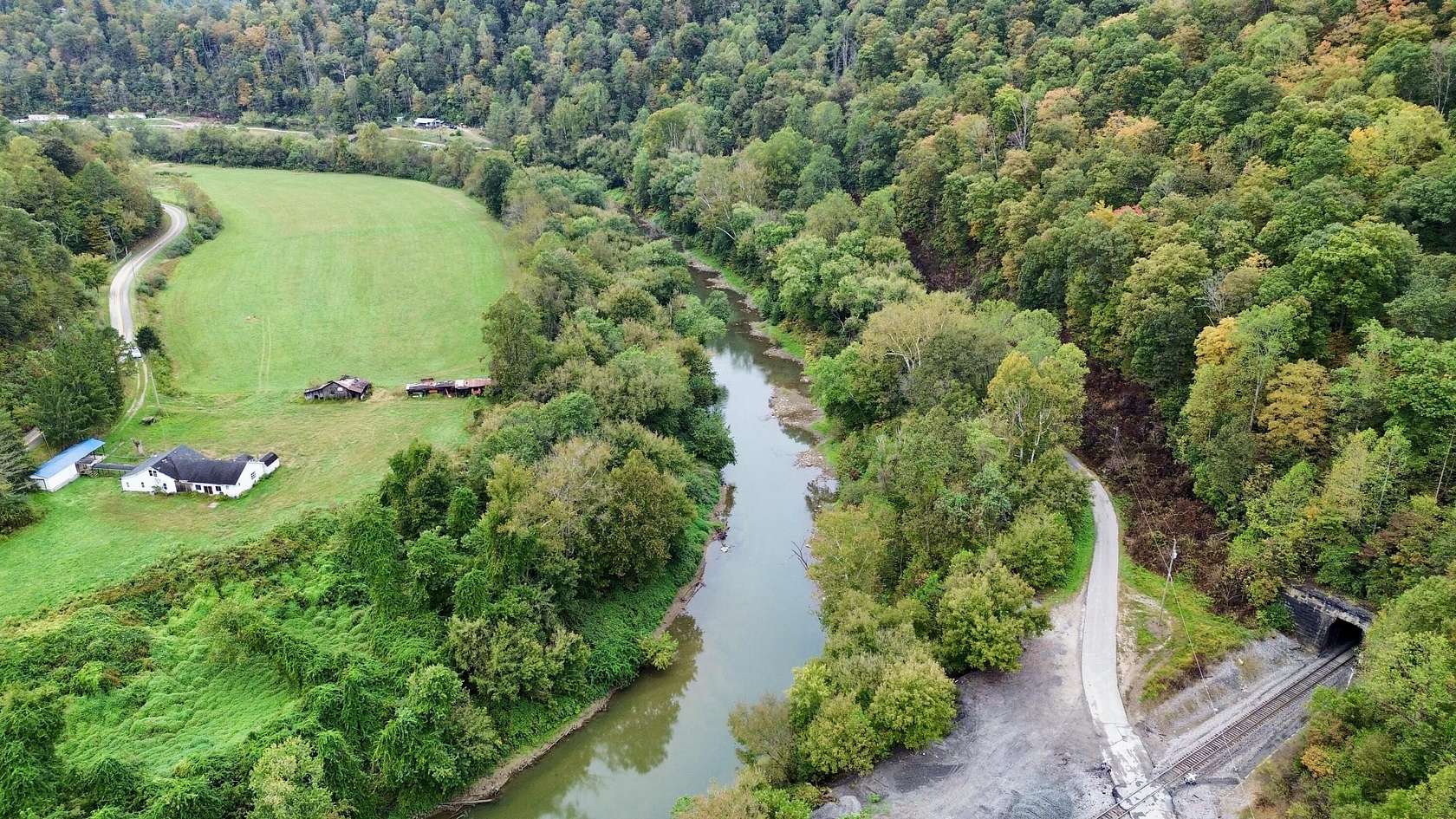 100 Acres of Land with Home for Sale in Warfield, Kentucky