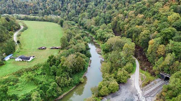 100 Acres of Land with Home for Sale in Warfield, Kentucky