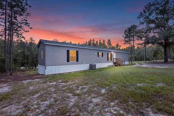 2.26 Acres of Land with Home for Sale in Bell, Florida