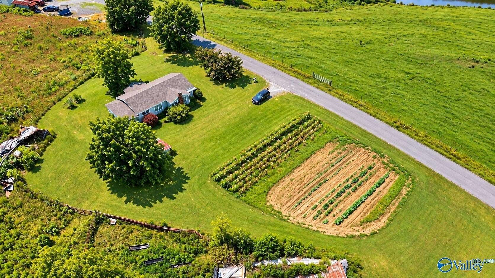 24 Acres of Agricultural Land with Home for Sale in Arab, Alabama