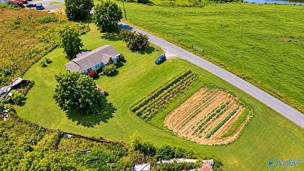 24 Acres of Agricultural Land with Home for Sale in Arab, Alabama