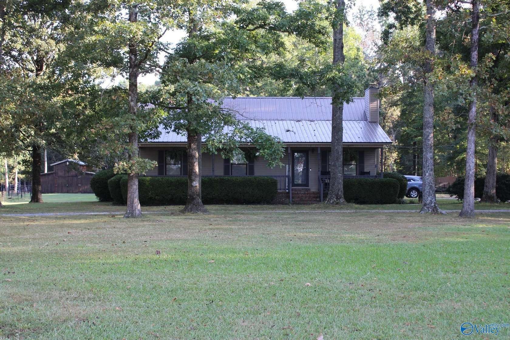 5 Acres of Land with Home for Sale in Elkmont, Alabama