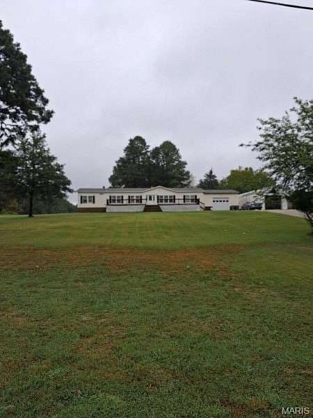 3.9 Acres of Land with Home for Sale in Doniphan, Missouri