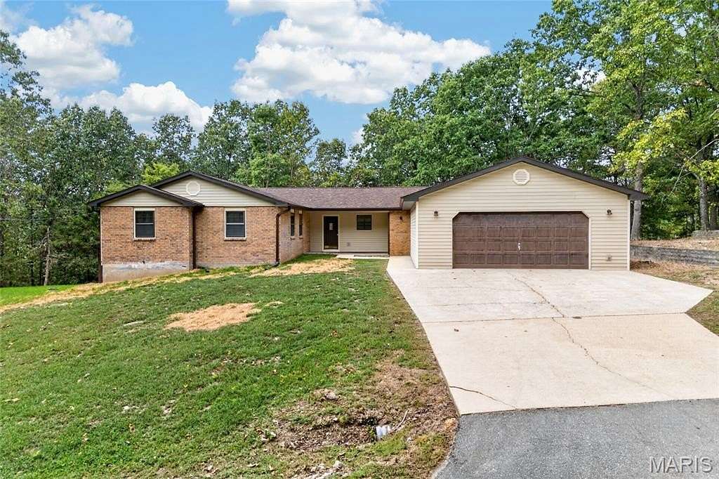 4.19 Acres of Land with Home for Sale in St. Robert, Missouri
