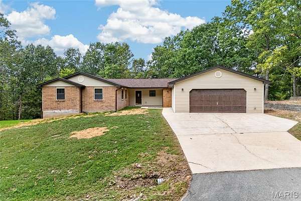4.19 Acres of Land with Home for Sale in St. Robert, Missouri