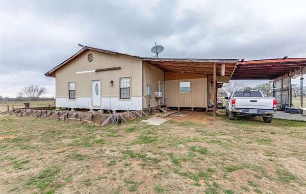 3 Acres of Land with Home for Sale in Devine, Texas