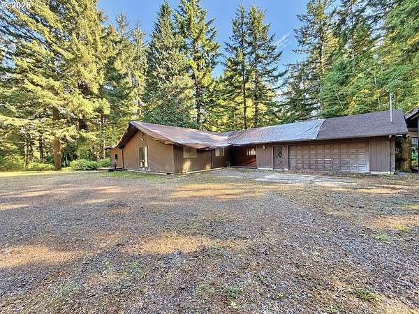 4.64 Acres of Land with Home for Sale in Florence, Oregon