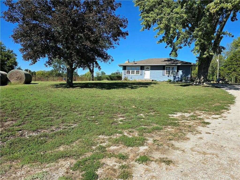 17 Acres of Land with Home for Sale in Odessa, Missouri