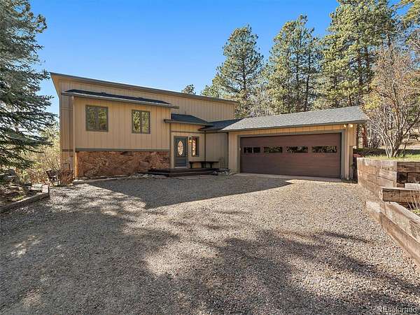10 Acres of Land with Home for Sale in Evergreen, Colorado