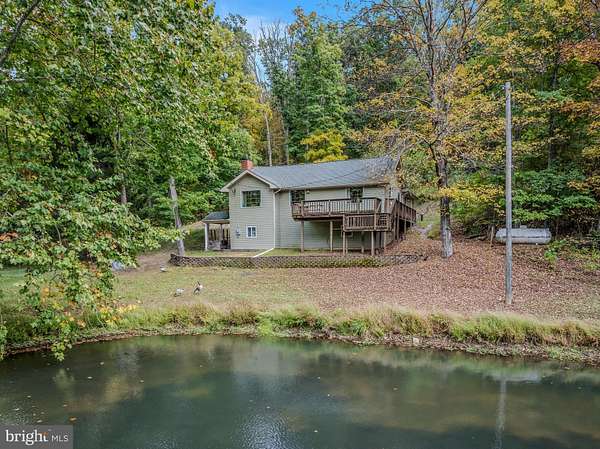 33 Acres of Land with Home for Sale in Great Cacapon, West Virginia
