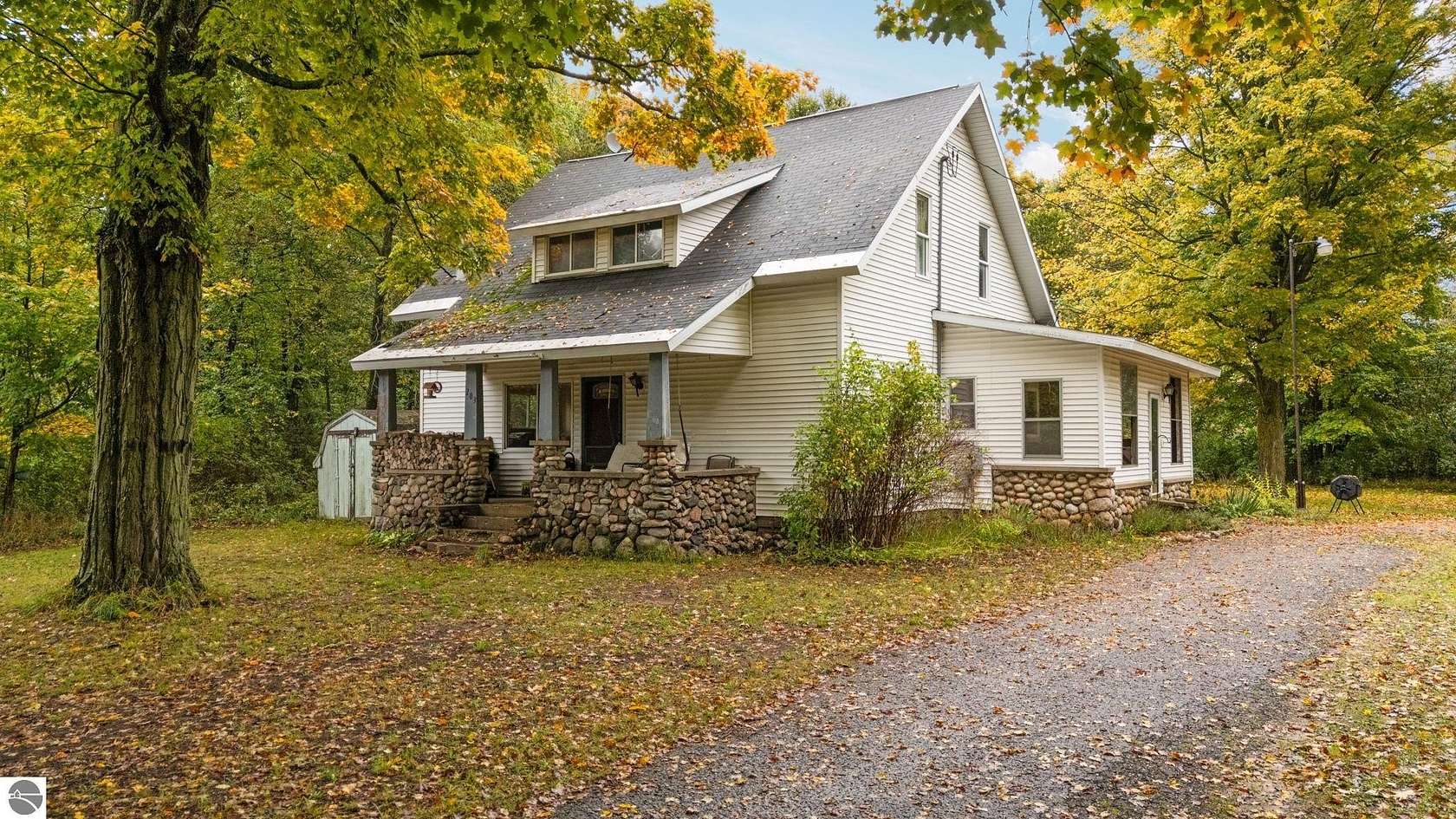 9.8 Acres of Land with Home for Sale in Beulah, Michigan
