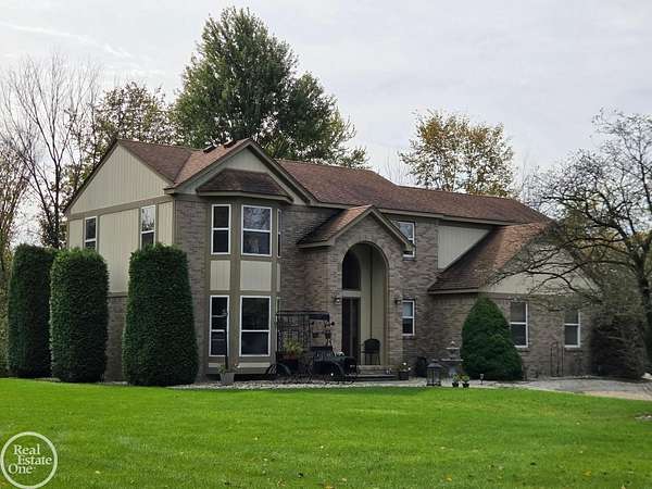 10.4 Acres of Land with Home for Sale in Casco, Michigan