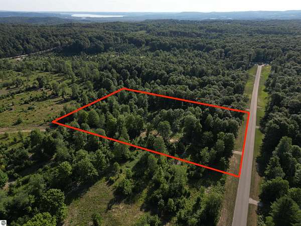 5 Acres of Residential Land for Sale in Maple City, Michigan