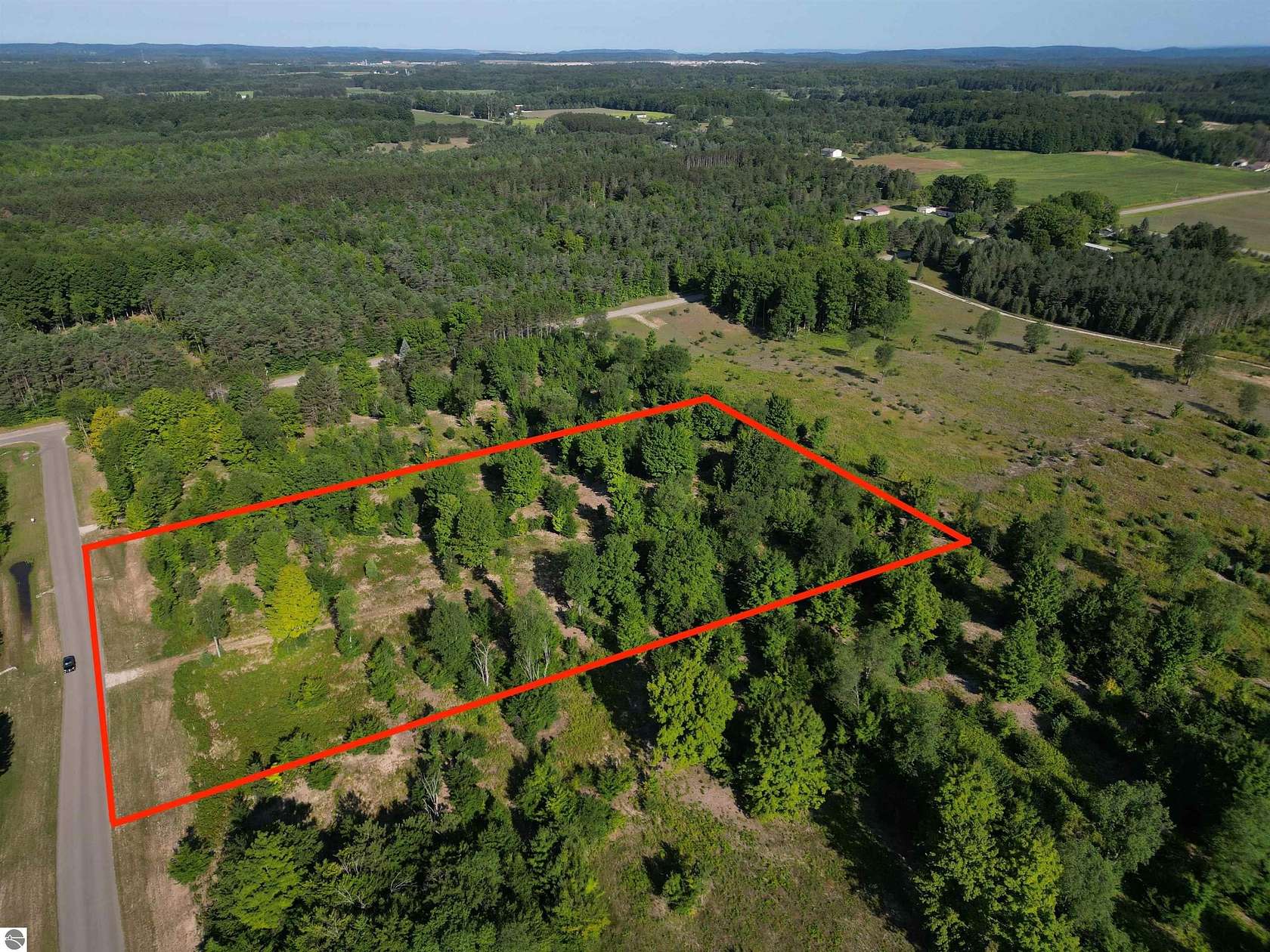 5 Acres of Land for Sale in Maple City, Michigan