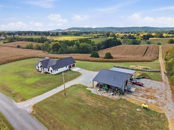 65 Acres of Agricultural Land with Home for Sale in Doyle, Tennessee