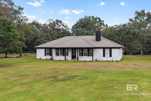 5.84 Acres of Land with Home for Sale in Loxley, Alabama