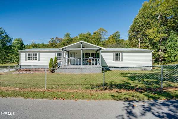 1.69 Acres of Land with Home for Sale in Hampton, Tennessee