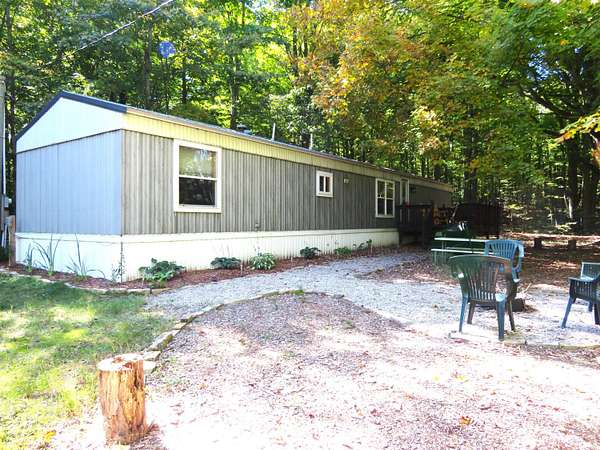18.5 Acres of Recreational Land with Home for Sale in Copemish, Michigan