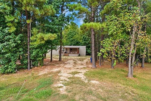 4.29 Acres of Land with Home for Sale in Kirbyville, Texas