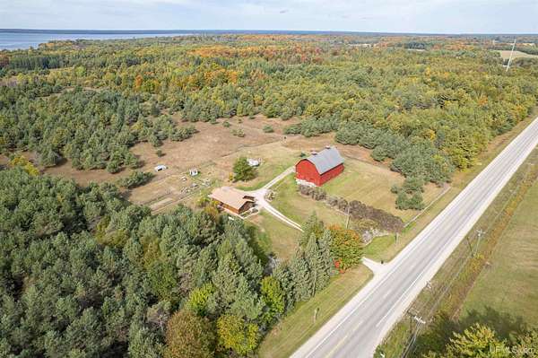 21 Acres of Recreational Land with Home for Sale in Manistique, Michigan