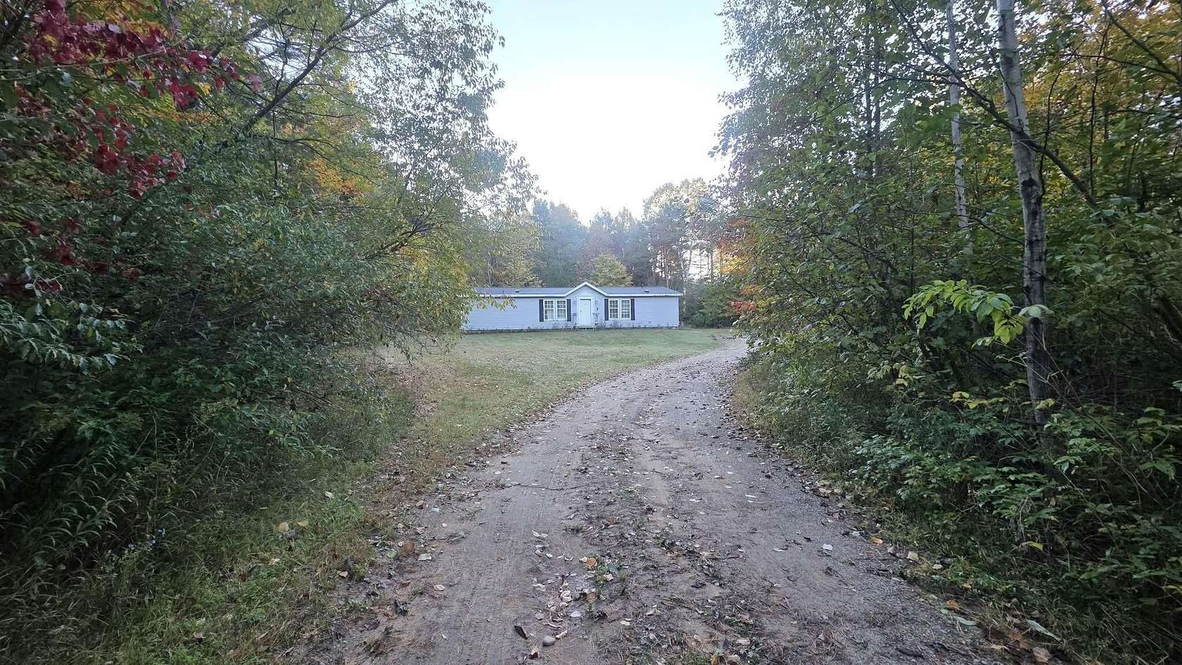 1.78 Acres of Land with Home for Sale in Harrisville, Michigan
