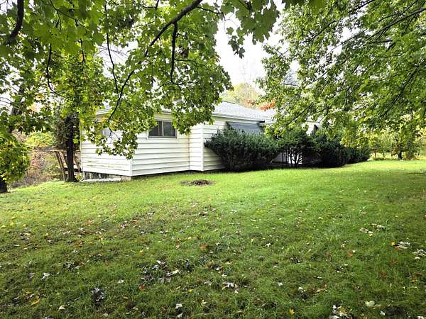 3 Acres of Land with Home for Sale in Lowell, Michigan