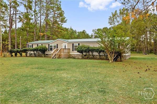 7.3 Acres of Land with Home for Sale in Pembroke, Georgia