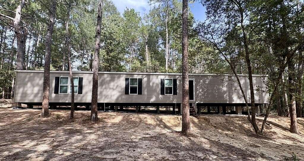 5.86 Acres of Land with Home for Sale in Chester, Texas