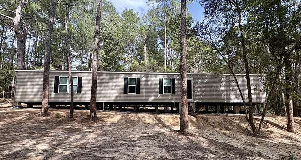 5.86 Acres of Land with Home for Sale in Chester, Texas