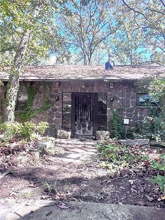 4.37 Acres of Land with Home for Sale in Rudy, Arkansas