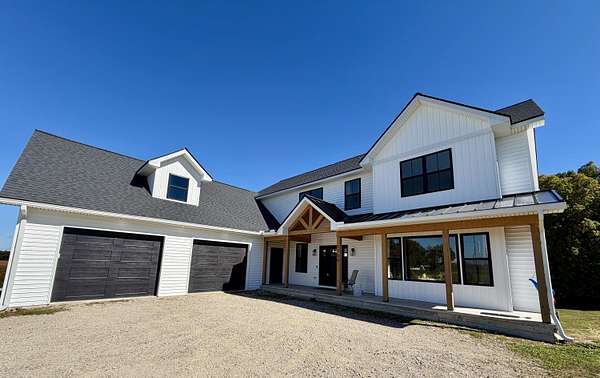 11.4 Acres of Recreational Land with Home for Sale in Fowlerville, Michigan