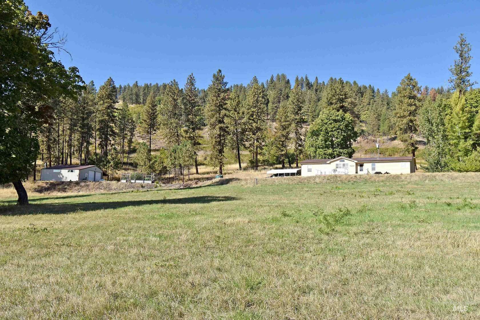 13.6 Acres of Recreational Land with Home for Sale in Lenore, Idaho