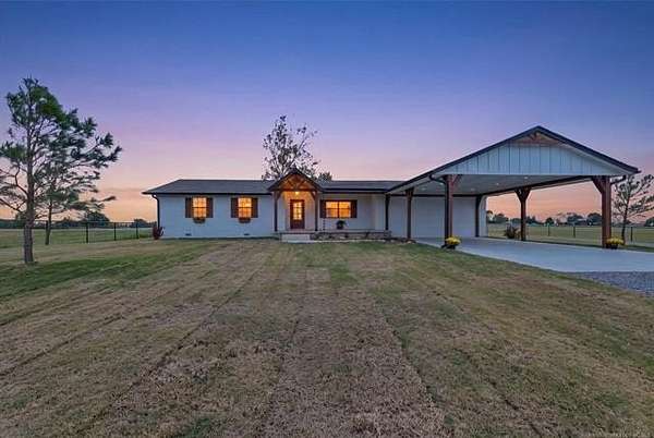 20 Acres of Agricultural Land with Home for Sale in Chouteau, Oklahoma