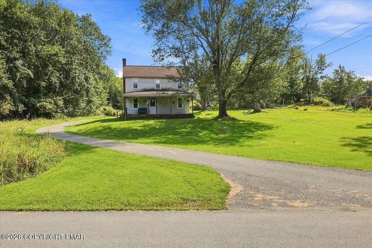 4.46 Acres of Land with Home for Sale in Canadensis, Pennsylvania